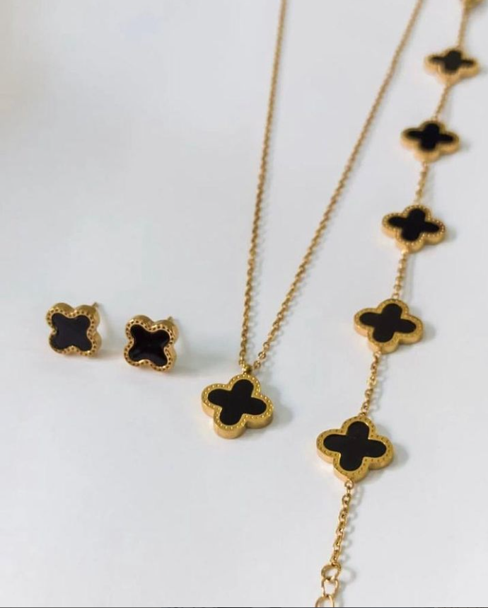 Van Cleef Clover Shaped Necklace with matching stud earrings and bracelet - A Symbol of Luck and Elegance