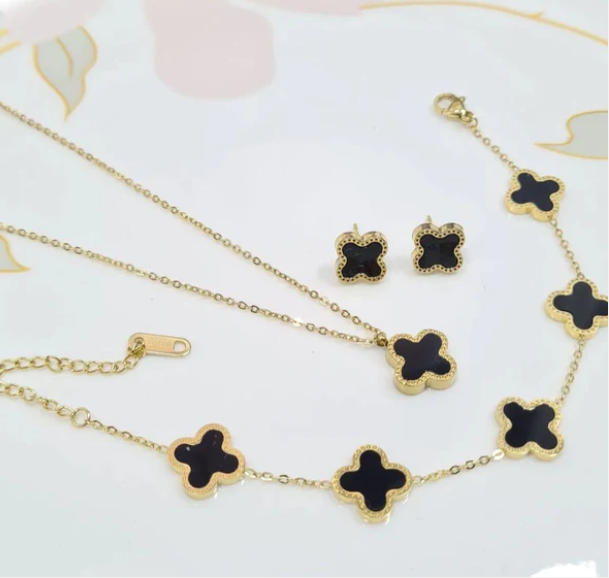 Van Cleef Clover Shaped Necklace with matching stud earrings and bracelet - A Symbol of Luck and Elegance